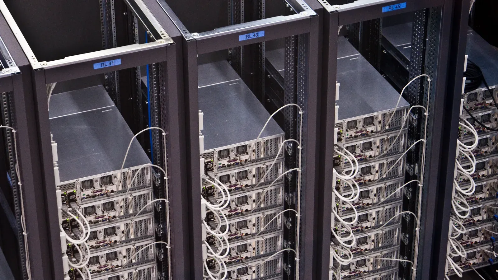 Server racks in a CERN computing room, photographed 25 February 2009. Photo by Florian Hirzinger, CC BY-SA 3.0, via Wikimedia Commons.
