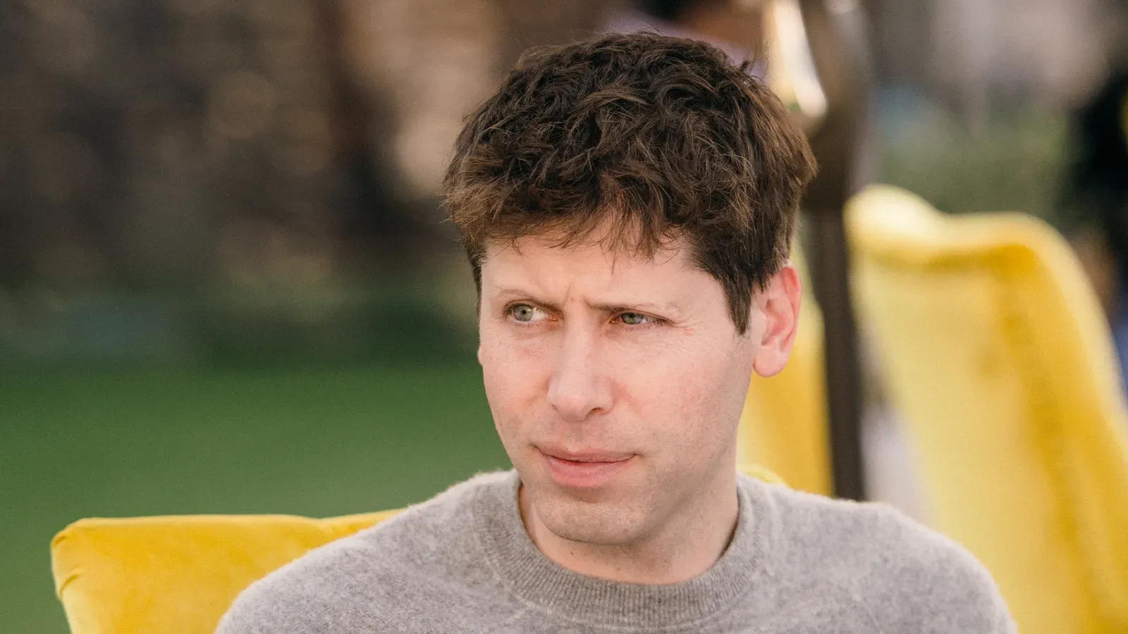 Sam Altman at The Grove conference on 17 November 2022, wearing a conference badge on a lanyard. Photo by Village Global, CC BY 2.0, via Wikimedia Commons.